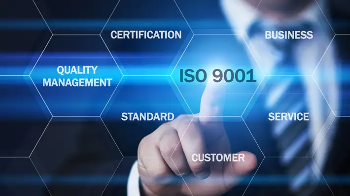 Person Pointing to ISO 9001 Certification